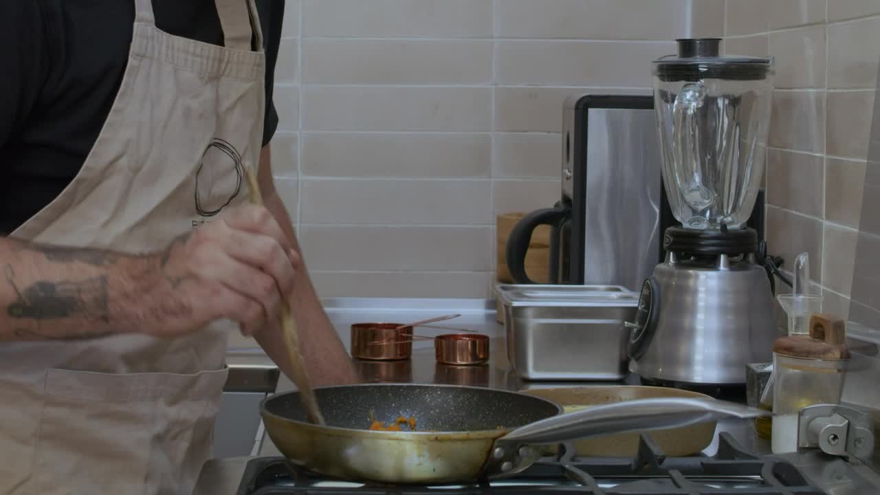 Stock Video Expert Cook Frying Something In A Pan Live Wallpaper For PC - Free Download