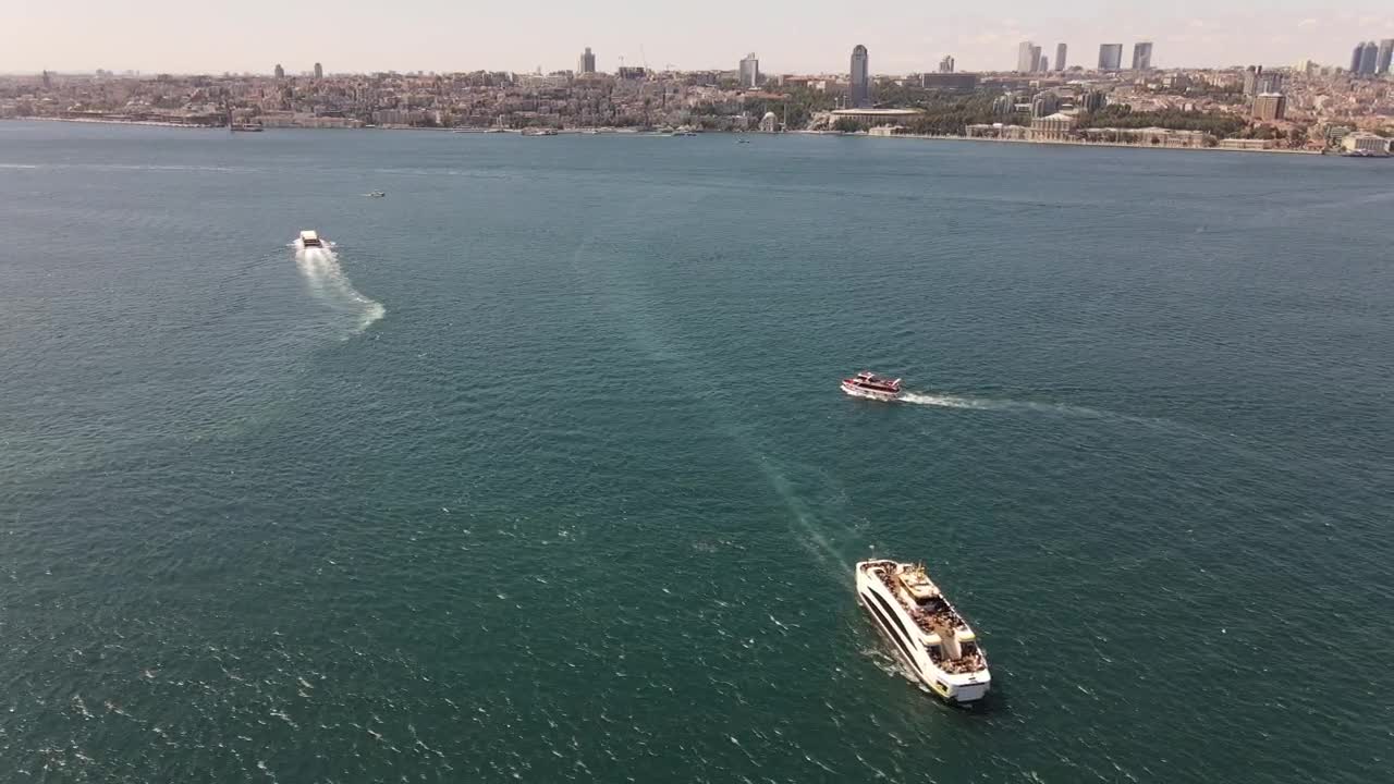 Stock Video Over The Sea With Boats Near A Sunny Coast Live Wallpaper - Free Download