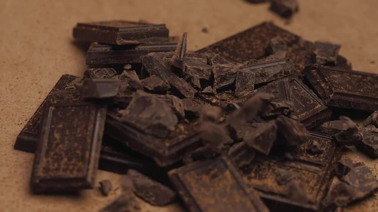 Video Stock Pile Of Pieces Of Chocolate Bars Falling Down Live Wallpaper Free - Free Download