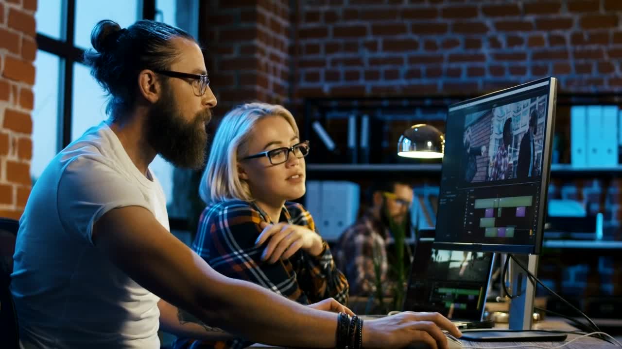 Stock Video Colleagues Working On Video Editing Live Wallpaper For PC - Free Download