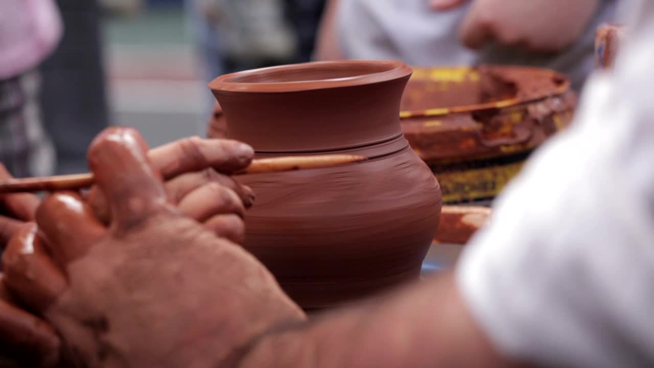 Free Video Stock teaching a child to craft clay pots Live Wallpaper - Free Download