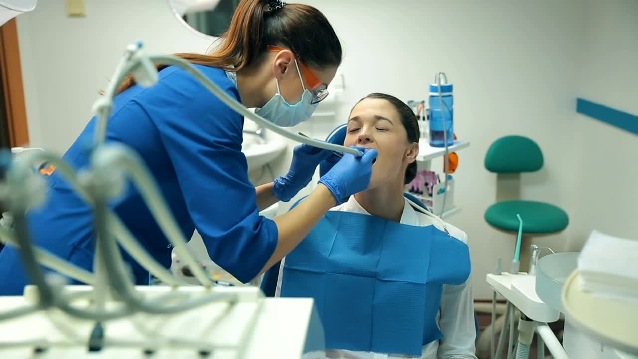 Stock Video Patient Receiving Dental Treatment Live Wallpaper - Free Download