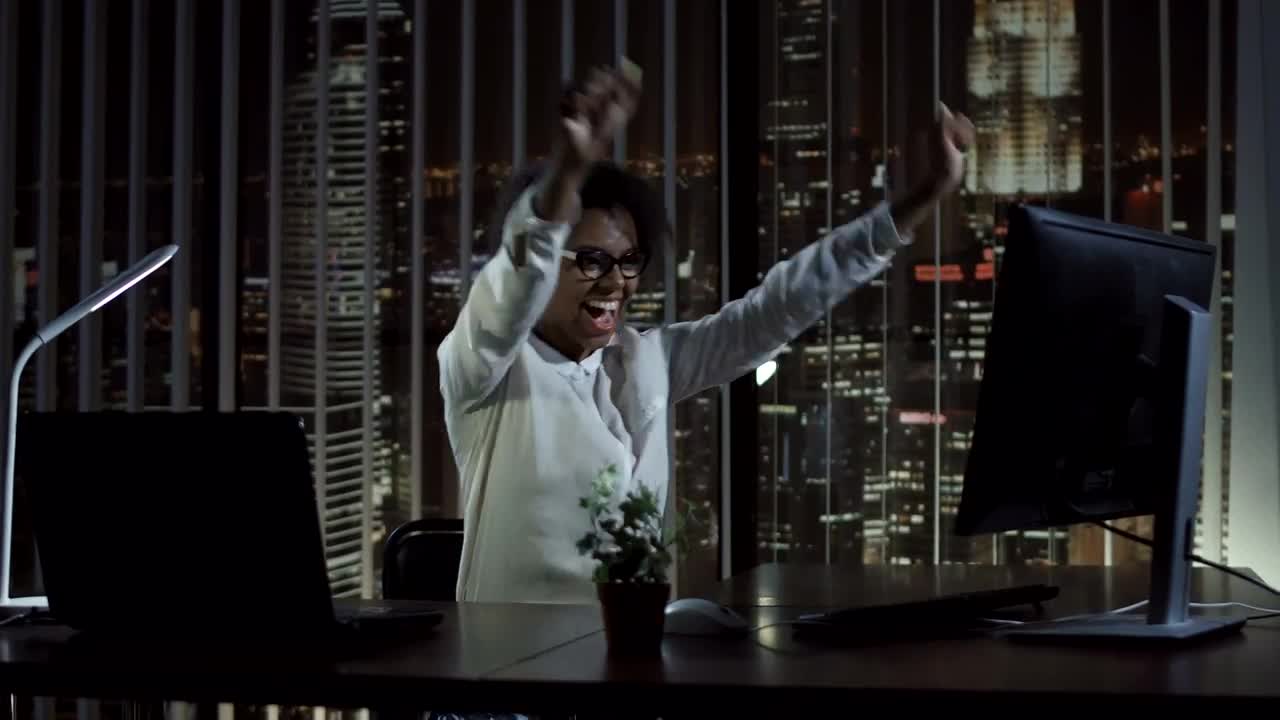Stock Footage Woman Celebrating In Her Desk Live Wallpaper - Free Download