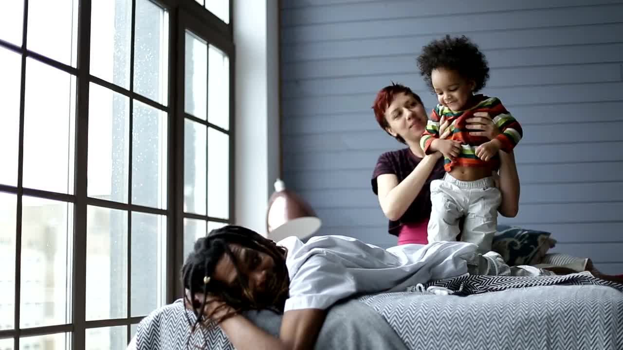 Free Stock Video Young Parents Having Fun With Their Little Son Live Wallpaper - Free Download