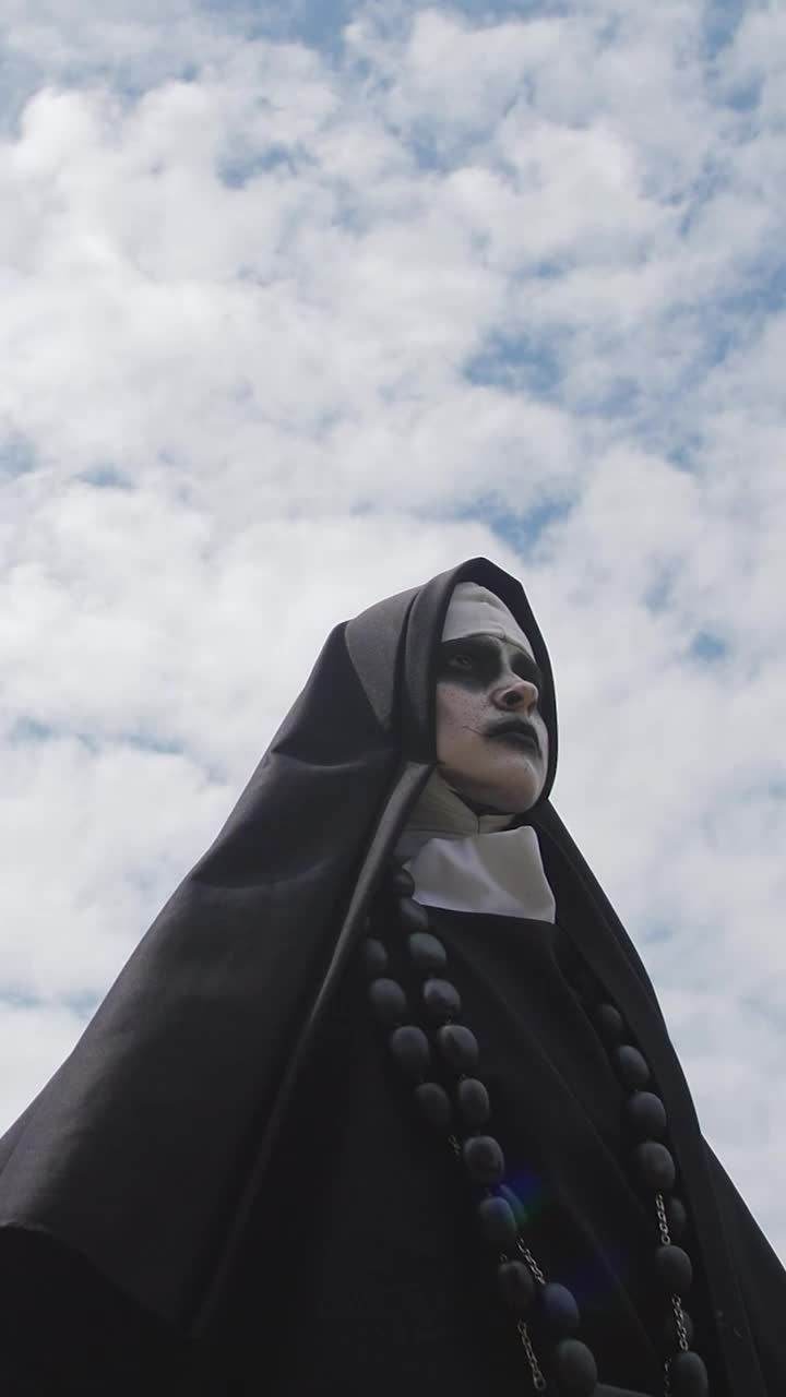 Video Stock Portrait Of A Devilish Nun Smiling Live Wallpaper Free - Free Download