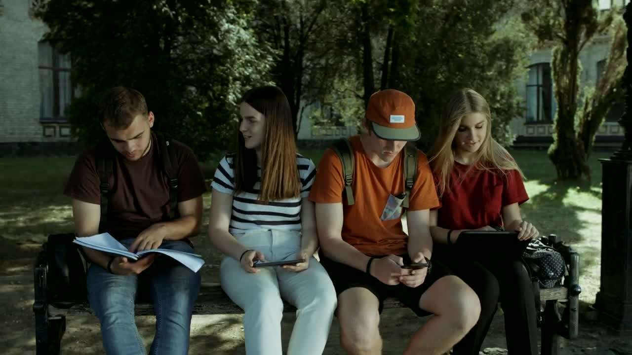 Free Video Stock Students Studying On A Bench Live Wallpaper - Free Download