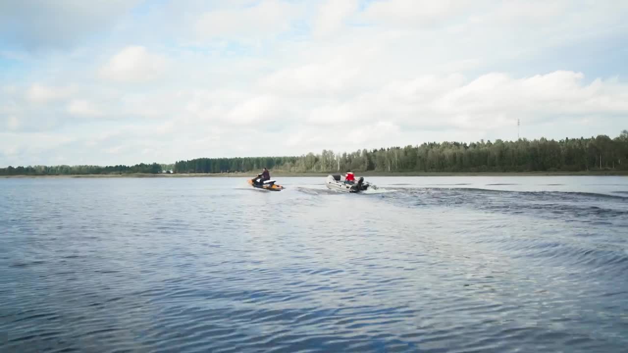 Stock Video Motorboat And Jet Ski Sailing On A Lake Live Wallpaper - Free Download