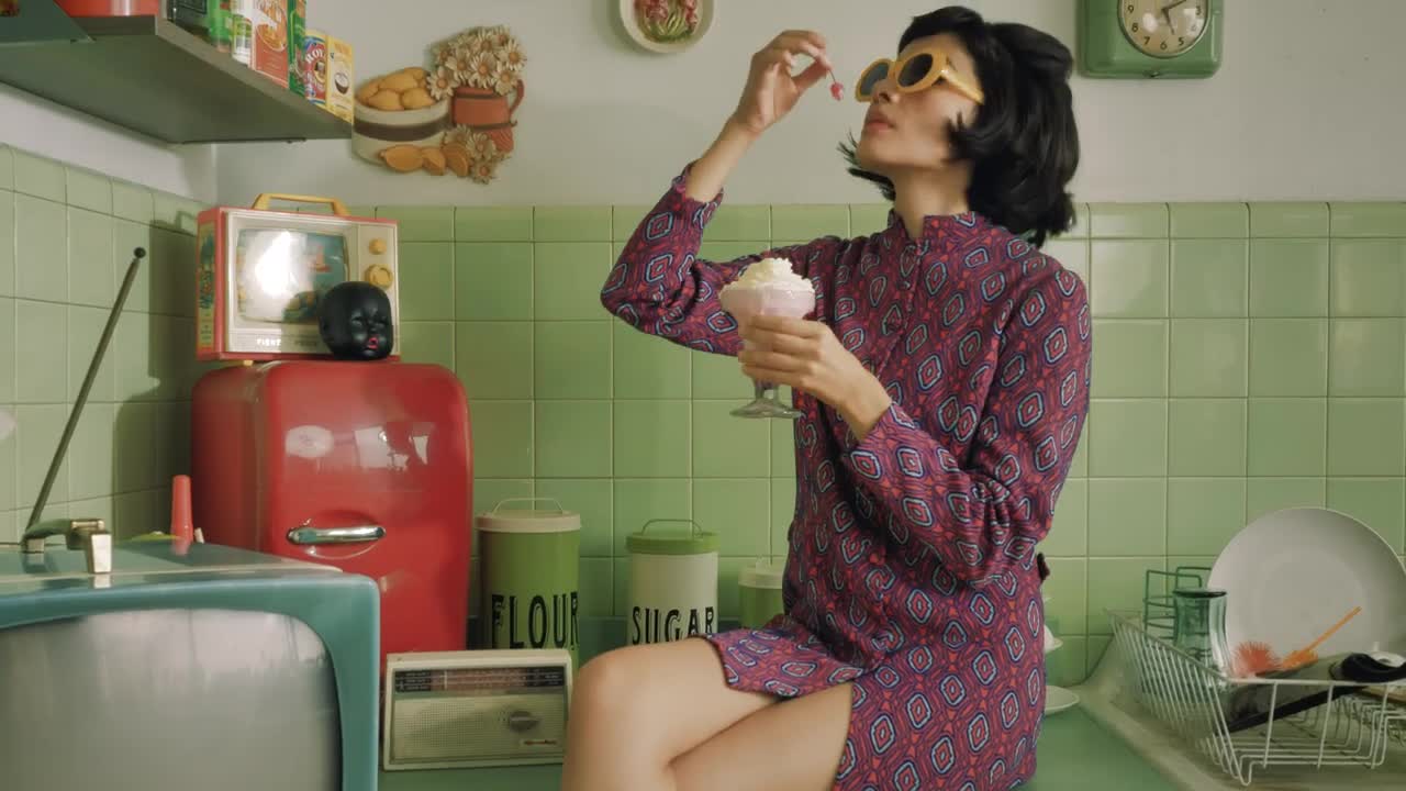 Free Stock Video Retro Woman Eating An Ice Cream In The Kitchen Live Wallpaper - Free Download
