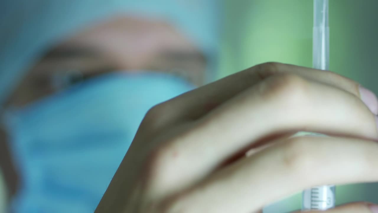 Stock Video Doctor Preparing A Syringe Live Wallpaper For PC - Free Download