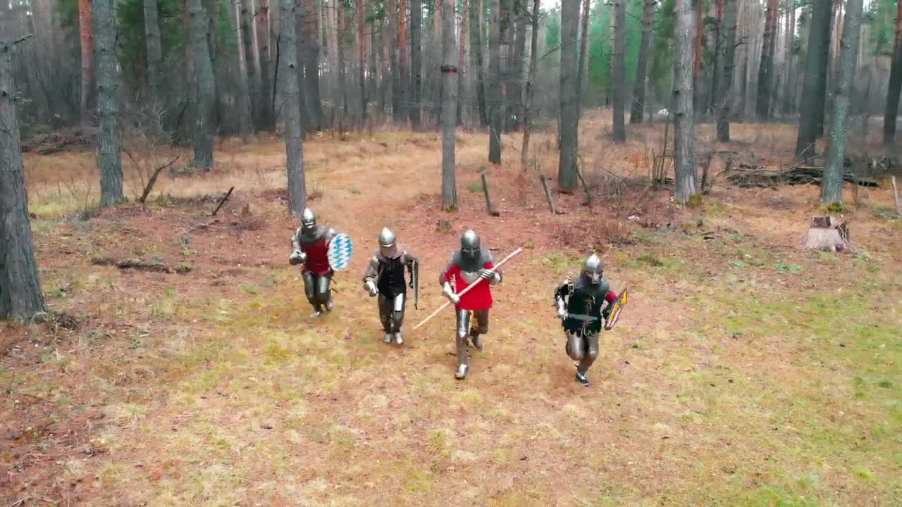 Stock Video Medieval Warriors Running In A Fores Animated Wallpaper - Free Download