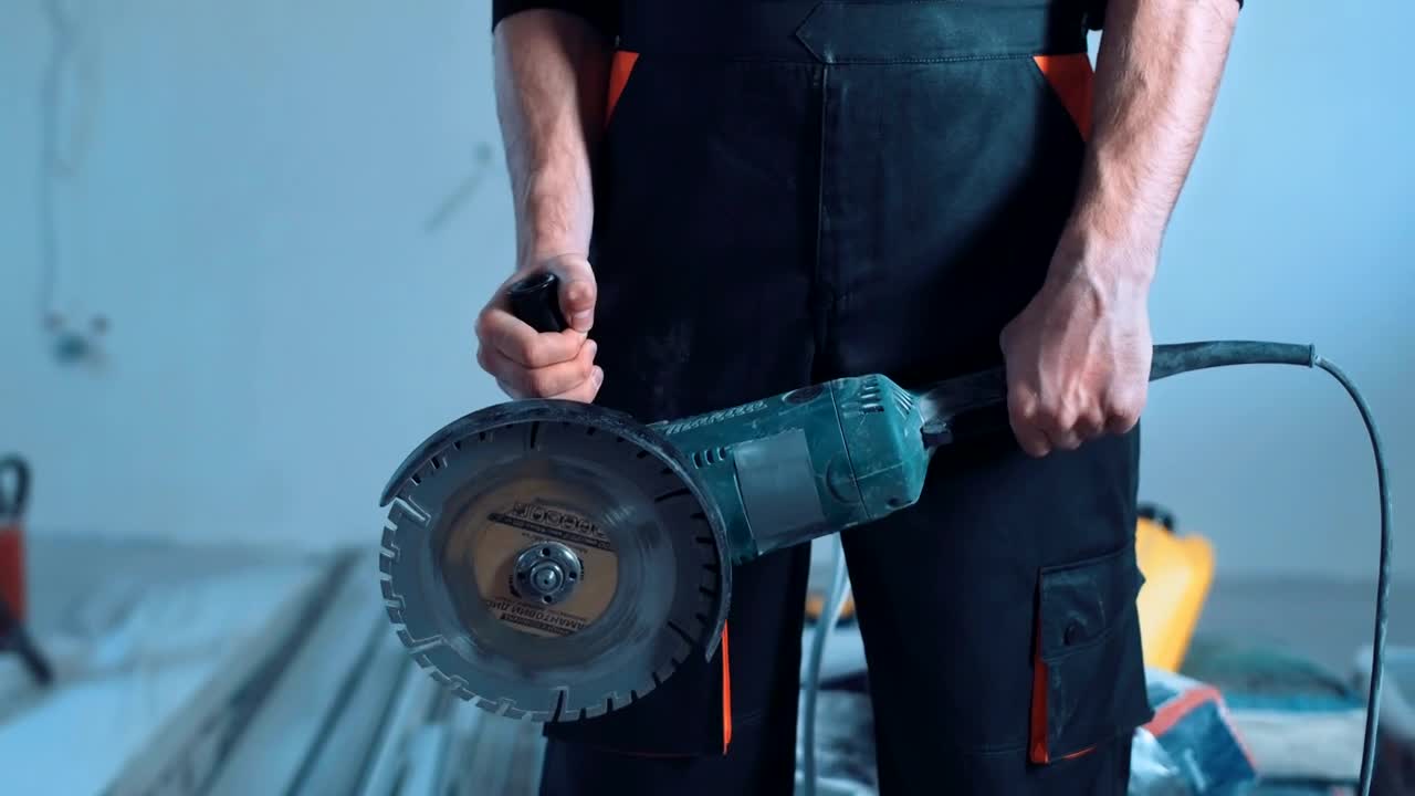 Stock Video Construction Worker Shows A Cutting Tool Live Wallpaper For PC - Free Download