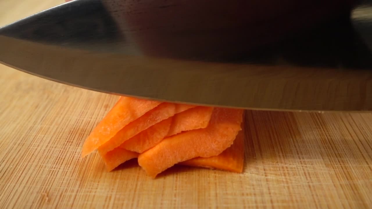 Free Video Stock Slicing Carrot On A Board Live Wallpaper - Free Download
