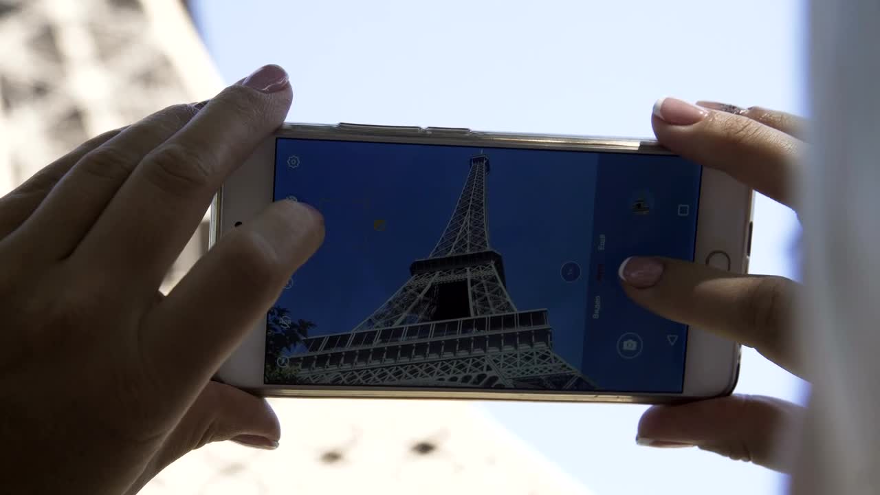 Free Video Stock taking a picture of the eiffel tower close up Live Wallpaper - Free Download