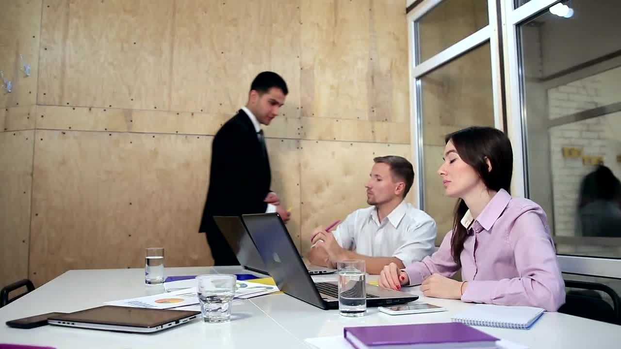 Free Video Stock team working together with laptops Live Wallpaper - Free Download
