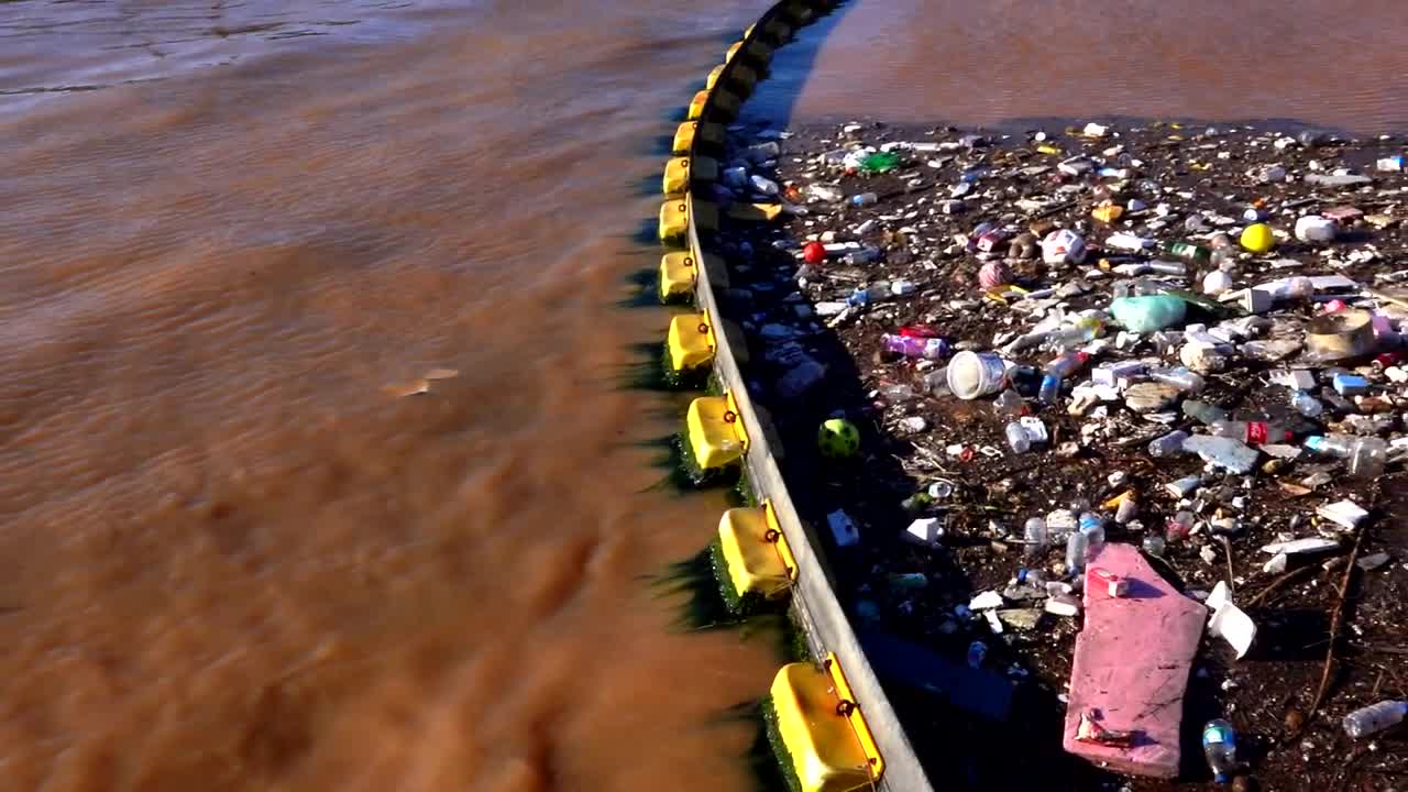 Stock Video Garbage Polluting The Water Of A Lake Live Wallpaper For PC - Free Download