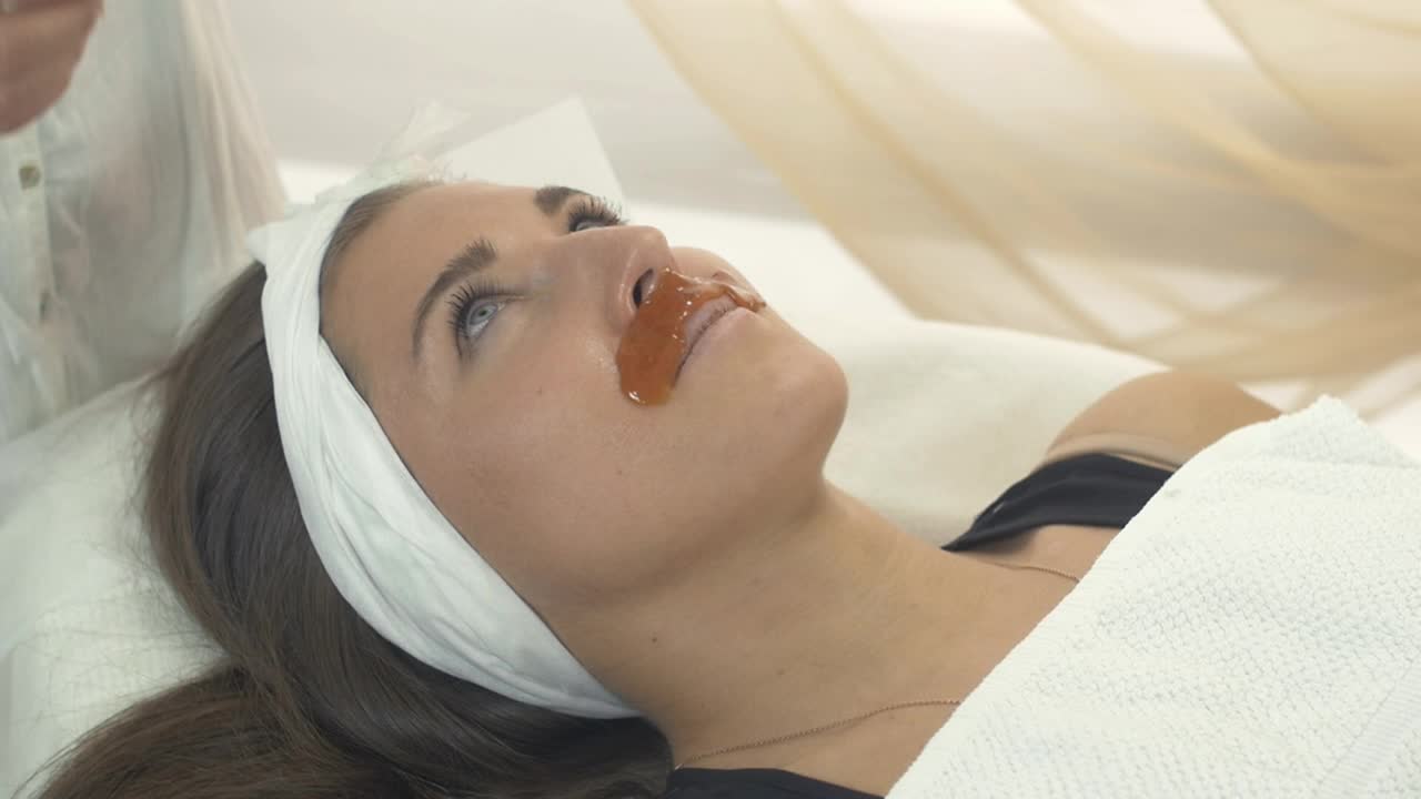 Stock Video Lip Waxing At A Beauty Salon Animated Wallpaper - Free Download