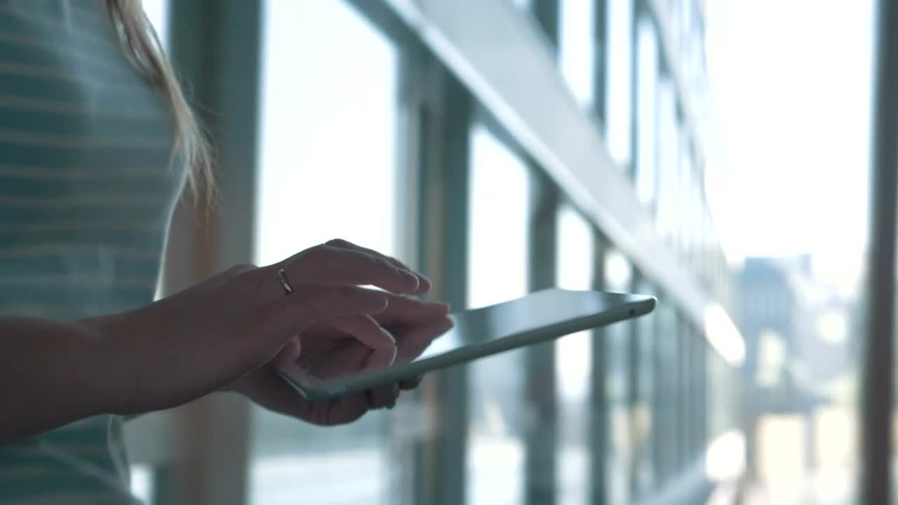 Stock Footage Walking Quickly With A Tablet Live Wallpaper - Free Download
