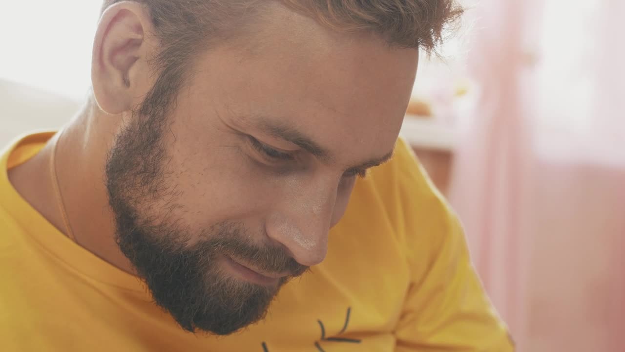 Stock Video Father With A Short Beard Next To His Baby Live Wallpaper For PC - Free Download