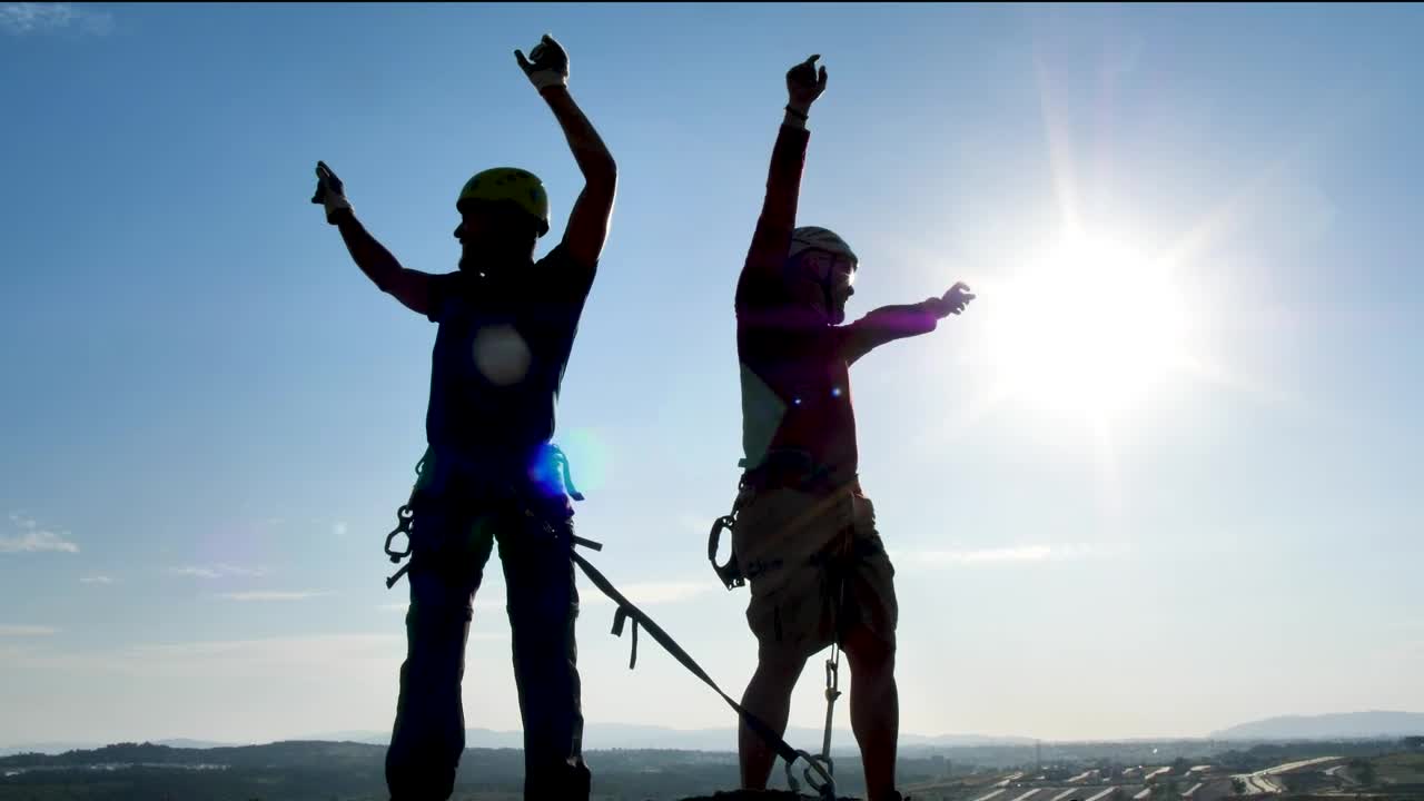 Free Stock Video Two Mountaineers Celebrating At The Top Live Wallpaper - Free Download