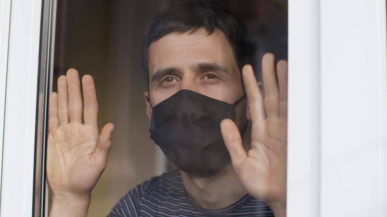 Stock Video Man With Mask Looks Longingly From His Windo Animated Wallpaper - Free Download