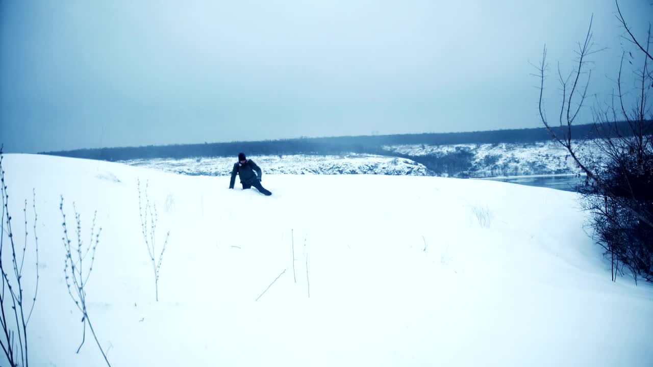 Free Video Stock tired man falls in the snow Live Wallpaper - Free Download
