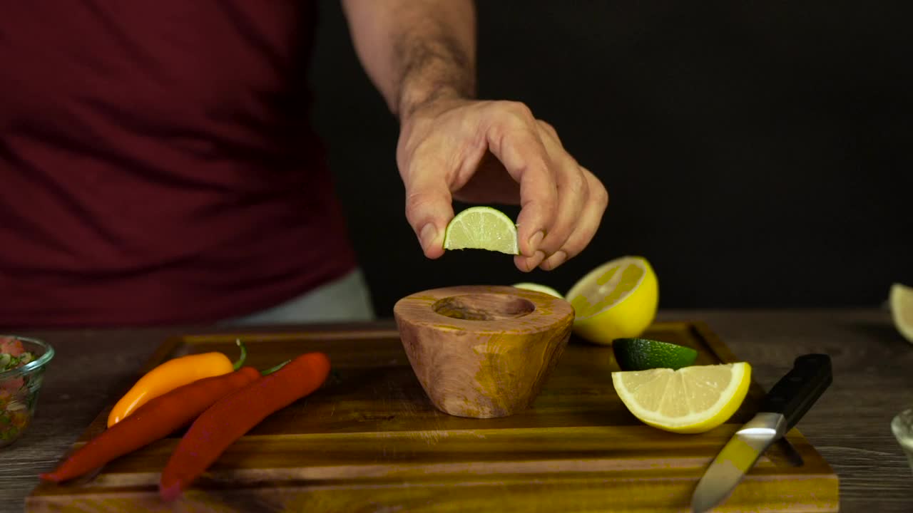 Free Video Stock Squeezing Lime Into A Bowl Live Wallpaper - Free Download