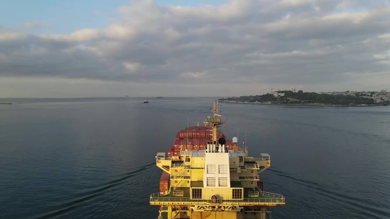 Stock Video Large Cargo Ship Sailing Away From A Port Animated Wallpaper - Free Download