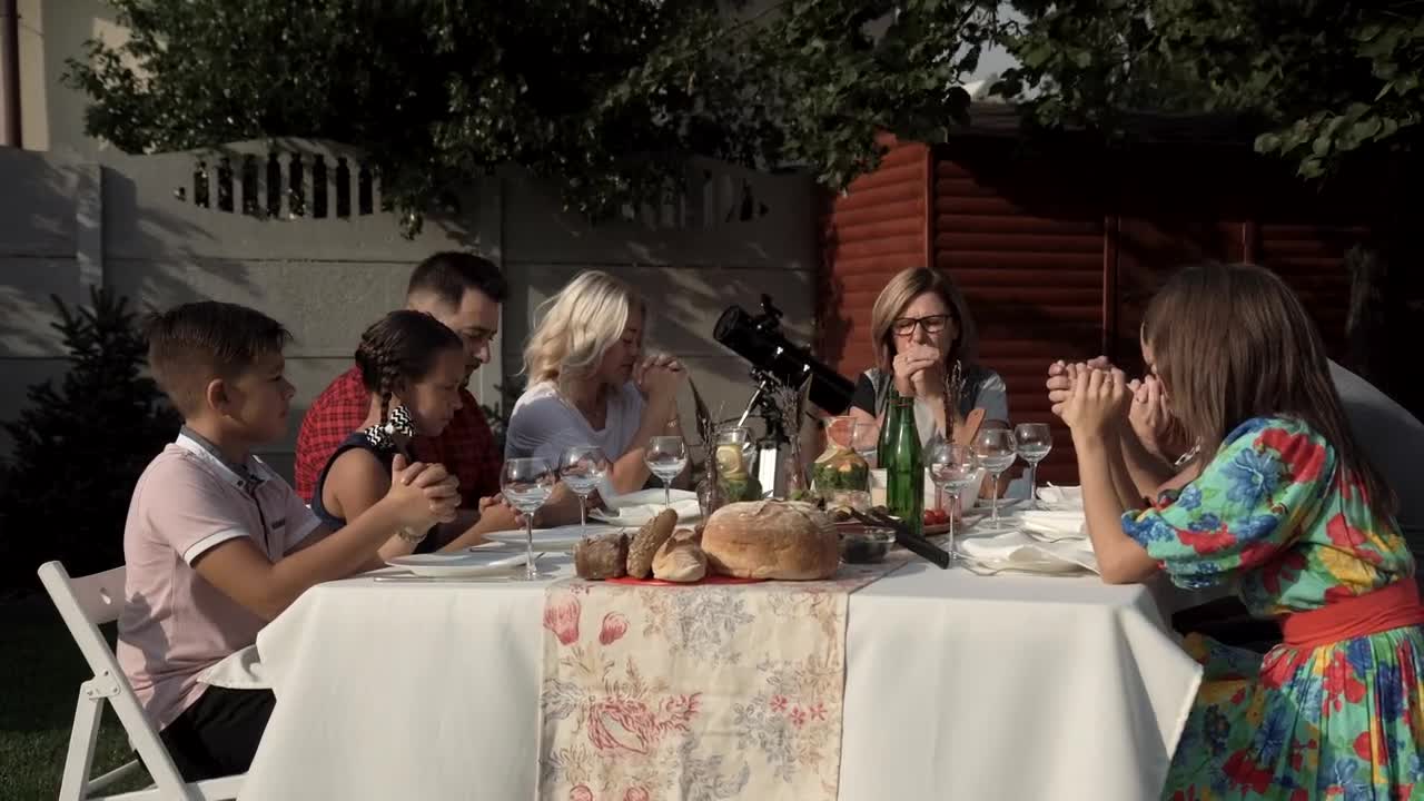 Stock Video Family Praying Before The Meal In The Garden Live Wallpaper For PC - Free Download