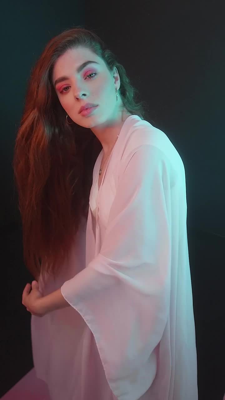 Video Stock Portrait Of A Girl Posing Captivatingly On Black Background Live Wallpaper Free - Free Download