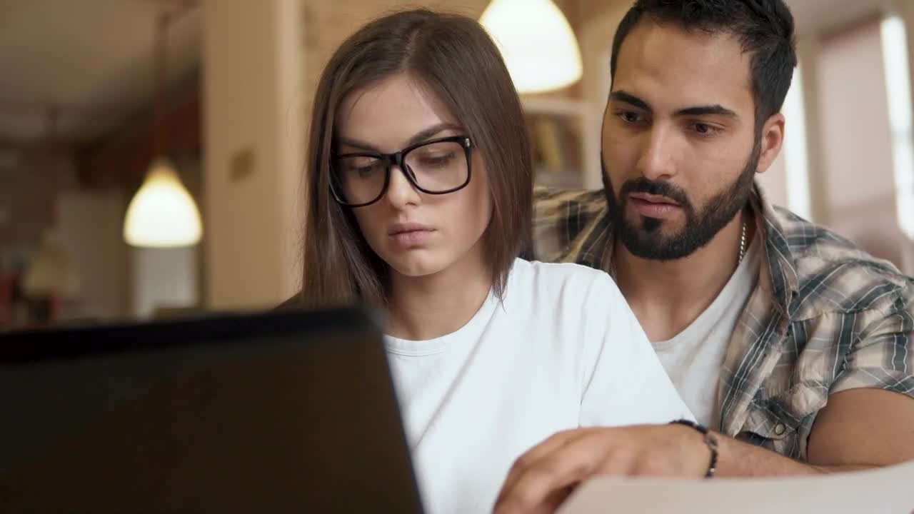 Free Video Stock team leader helps coworker solve problem Live Wallpaper - Free Download