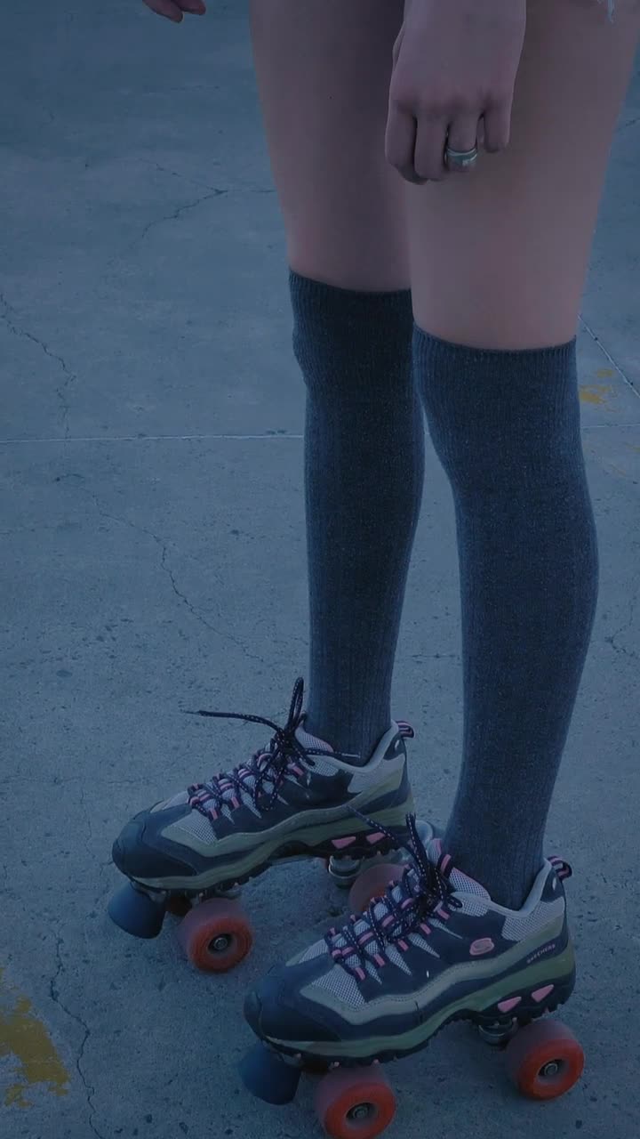 Stock Video Girl With Roller Skates Standing In The Middle Of A Live Wallpaper For PC - Free Download