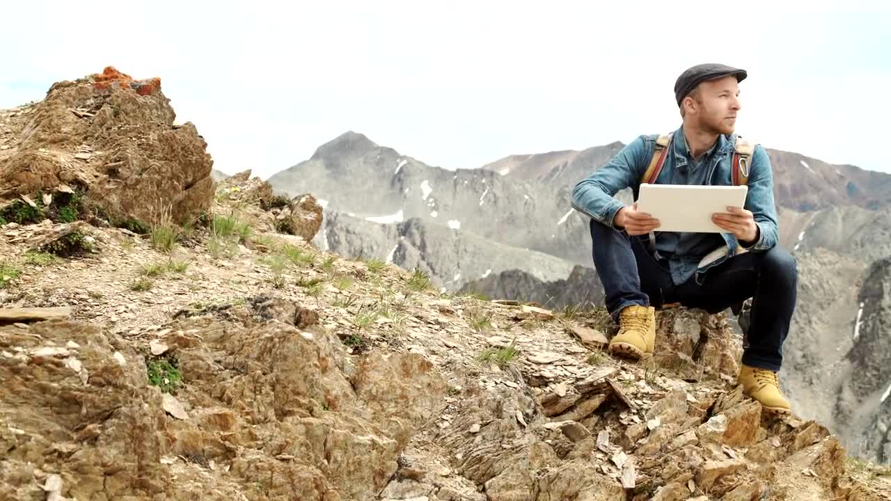 Stock Video Man Connected To A Network On A Mountain Animated Wallpaper - Free Download