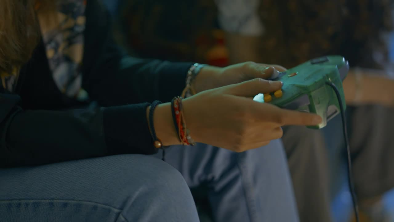 Stock Video Concentrated Girl Playing Video Games With Her Friends Live Wallpaper For PC - Free Download