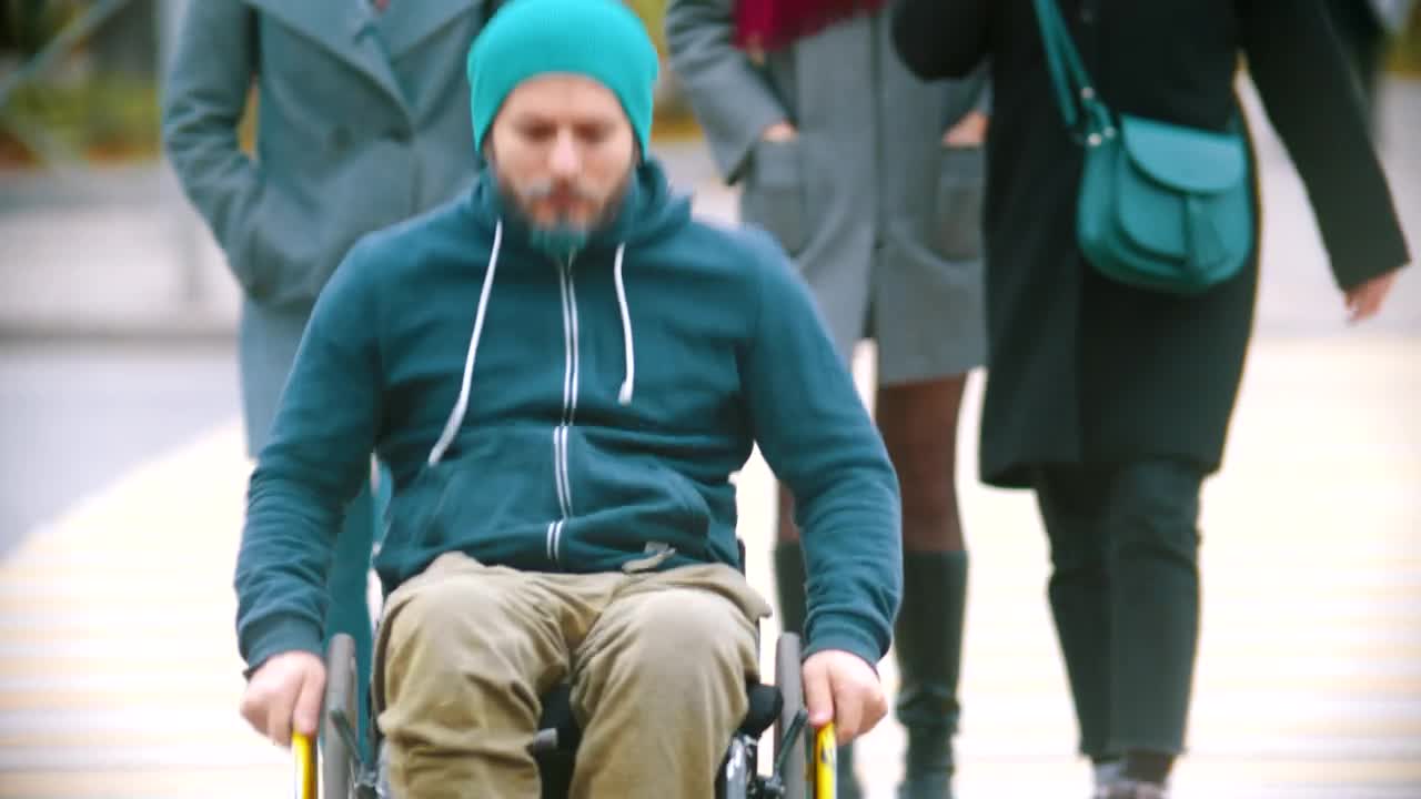 Stock Video Disabled Man In A Wheelchair On The Street Live Wallpaper For PC - Free Download