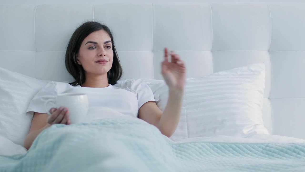Stock Video Future Woman Using Holographic Web Browser In Bed Live Wallpaper For PC - Free Download