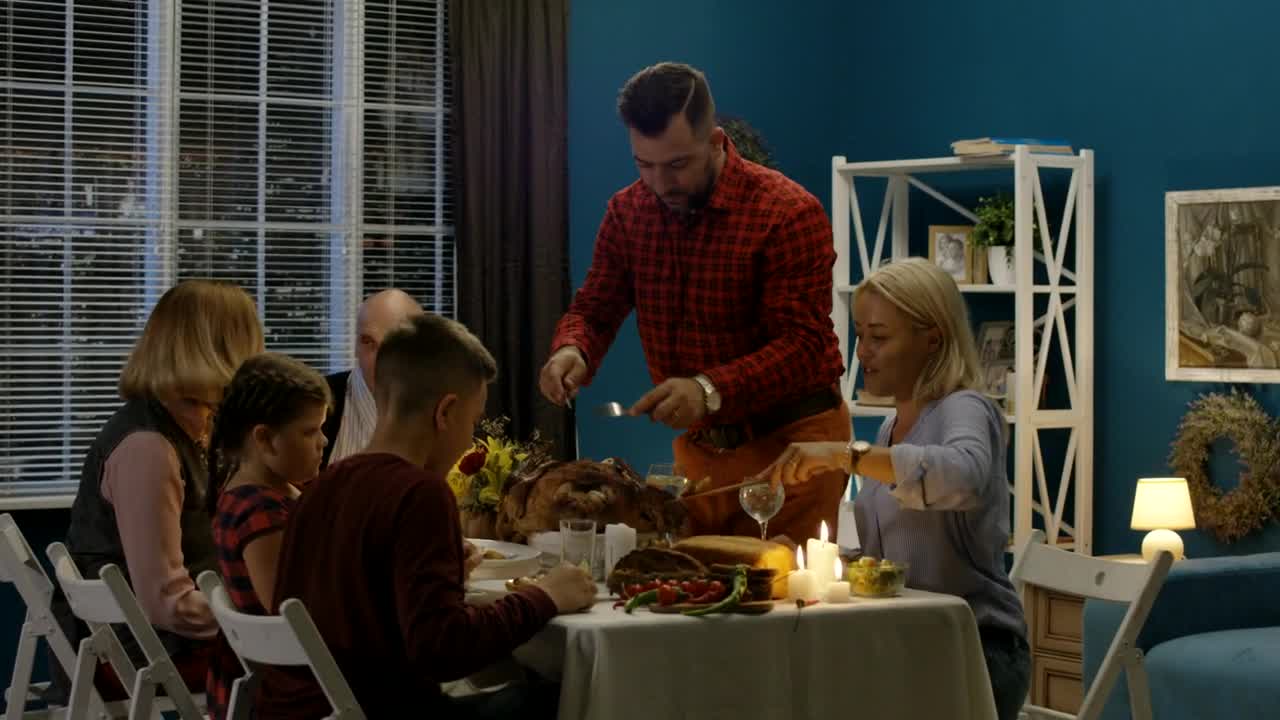 Stock Video Man Serving The Turkey For His Famil Animated Wallpaper - Free Download