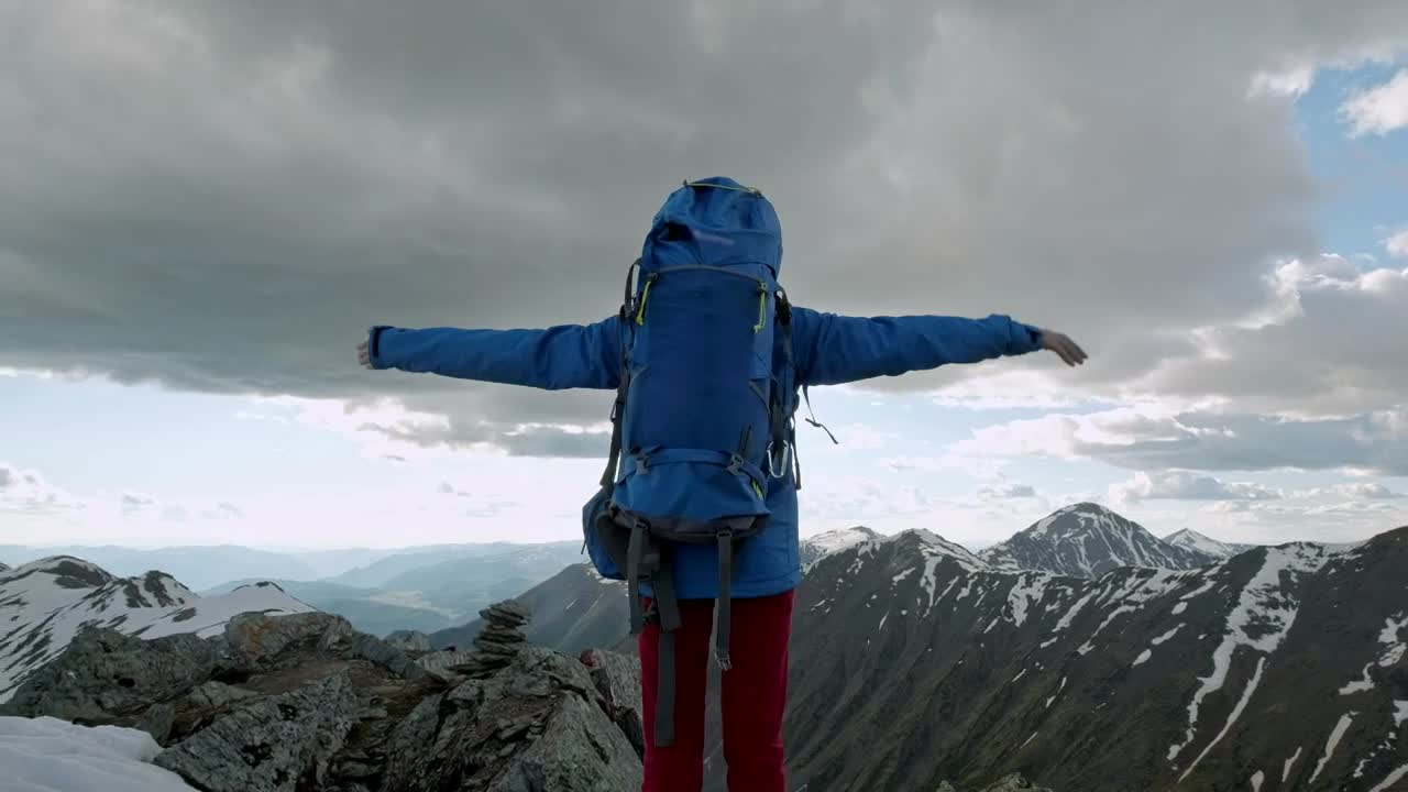 Stock Video Mountaineer Raising Hands On Top Of A Mountain Live Wallpaper - Free Download