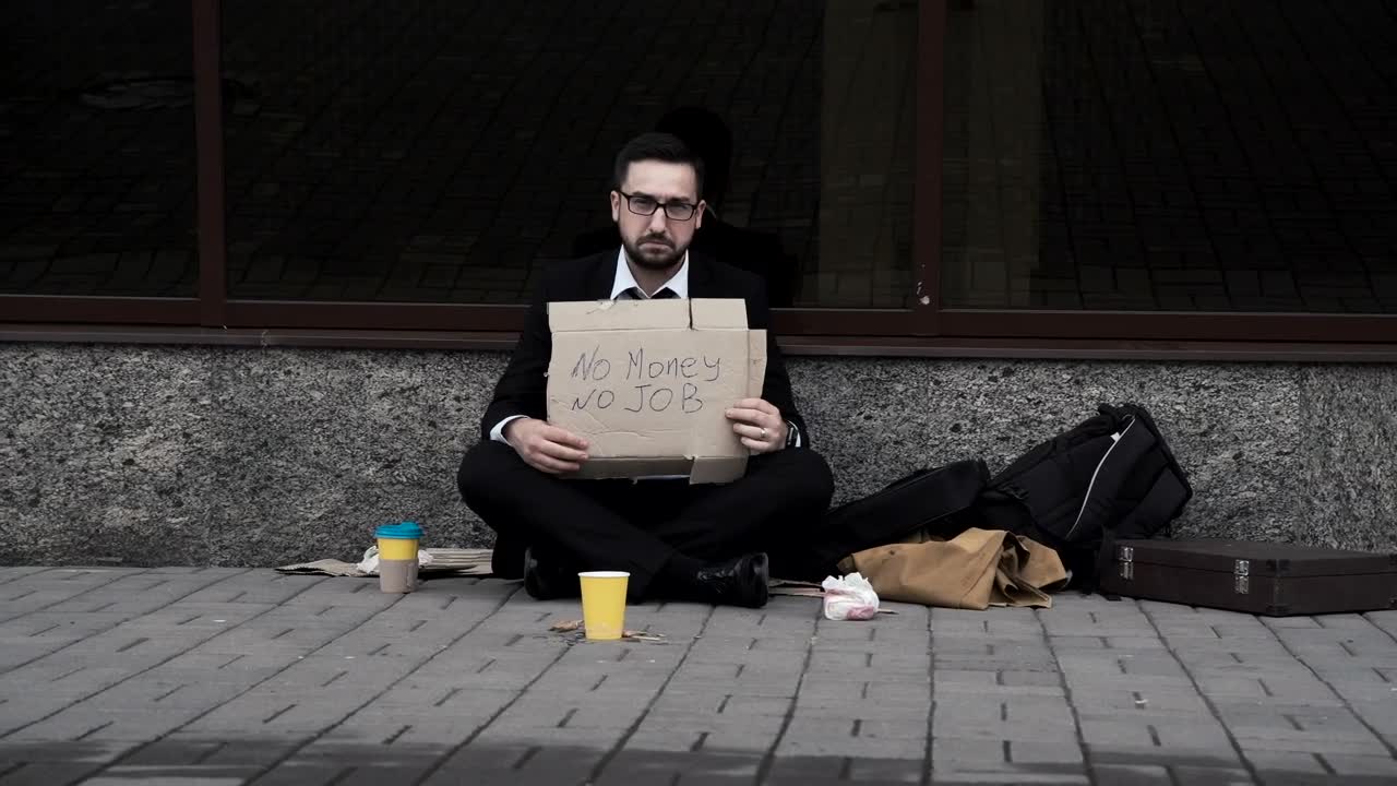 Stock Video Man In A Suit Begging On The Street Animated Wallpaper - Free Download