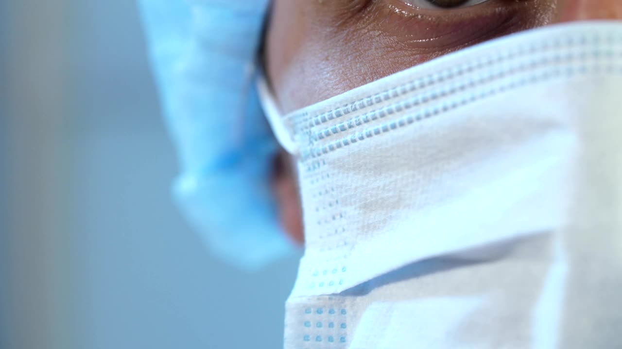 Stock Video Half Face Of A Doctor Wearing Mask Live Wallpaper For PC - Free Download