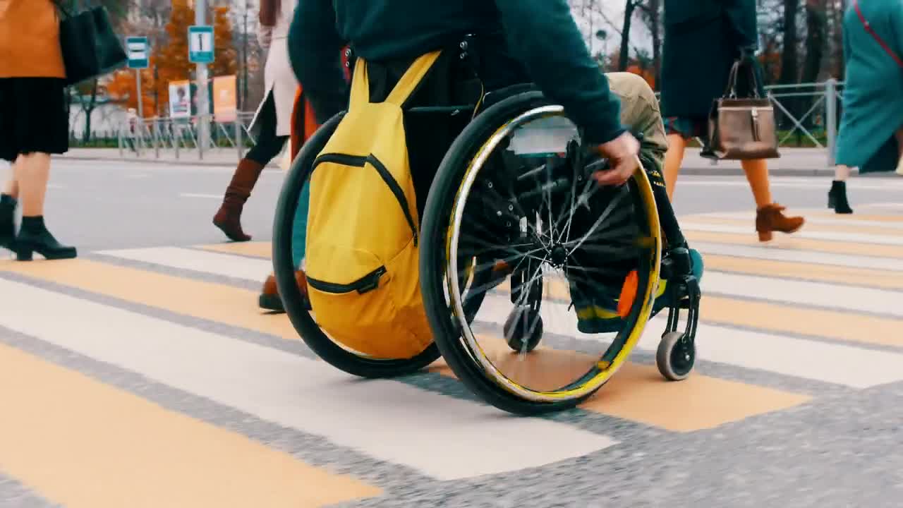 Stock Video Disabled Man On A Wheelchair On Pedestrian Crossing Live Wallpaper For PC - Free Download
