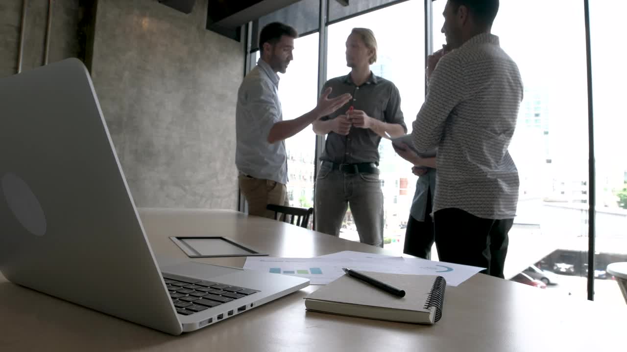 Stock Video Coworkers Standing By A Window Live Wallpaper For PC - Free Download