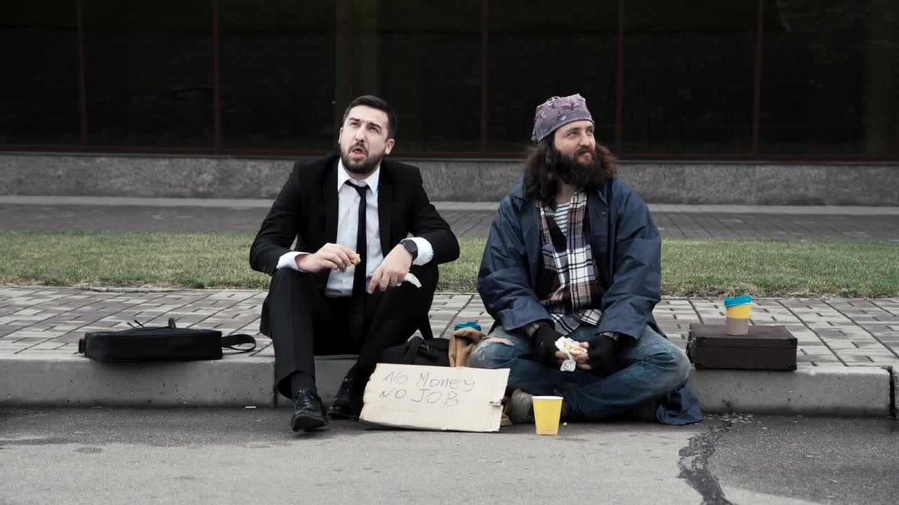 Video Stock Businessman And Homeless Sitting On The Sidewalk Live Wallpaper For PC - Free Download
