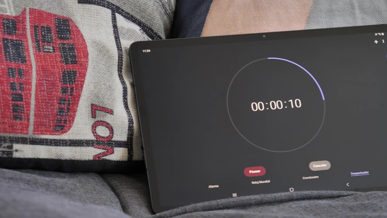 Free Video Stock tablet on a sofa running a timer Live Wallpaper - Free Download