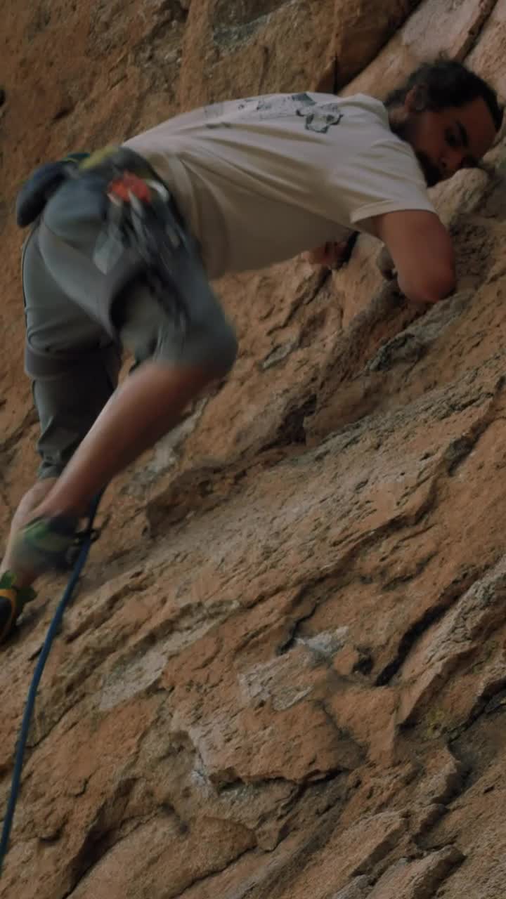 Free Video Stock Skilled And Experienced Mountaineer Climbing A Rocky Mountain Live Wallpaper - Free Download