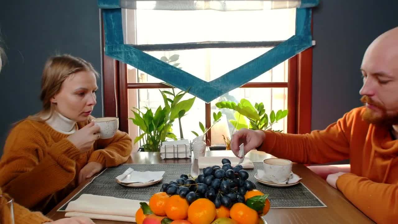 Stock Video Father And Her Daughters Drinking Coffee And Juice Live Wallpaper For PC - Free Download