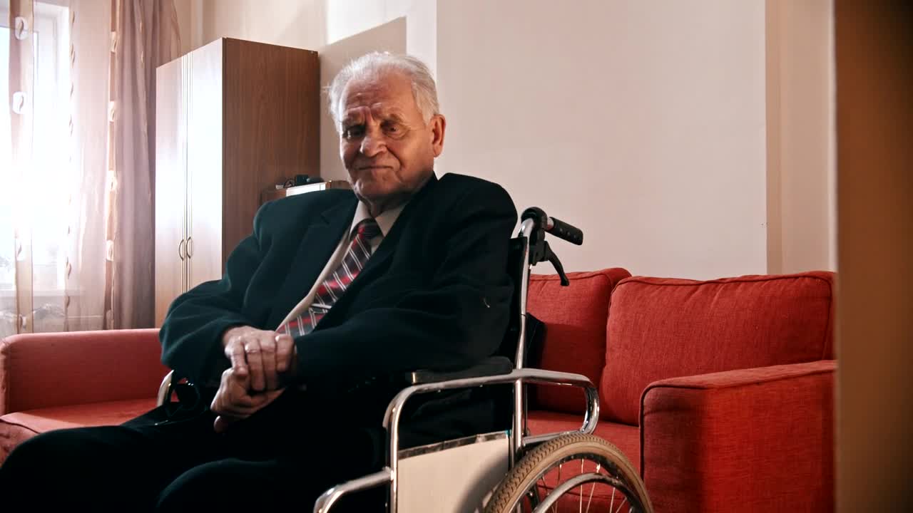 Stock Video Elder On A Wheelchair Looking Sad Live Wallpaper For PC - Free Download