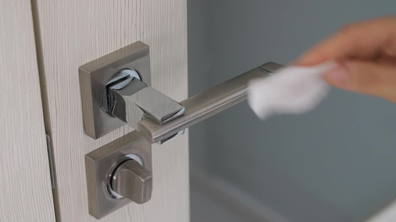 Video Stock Person Sanitizing A Doorknob Live Wallpaper Free - Free Download