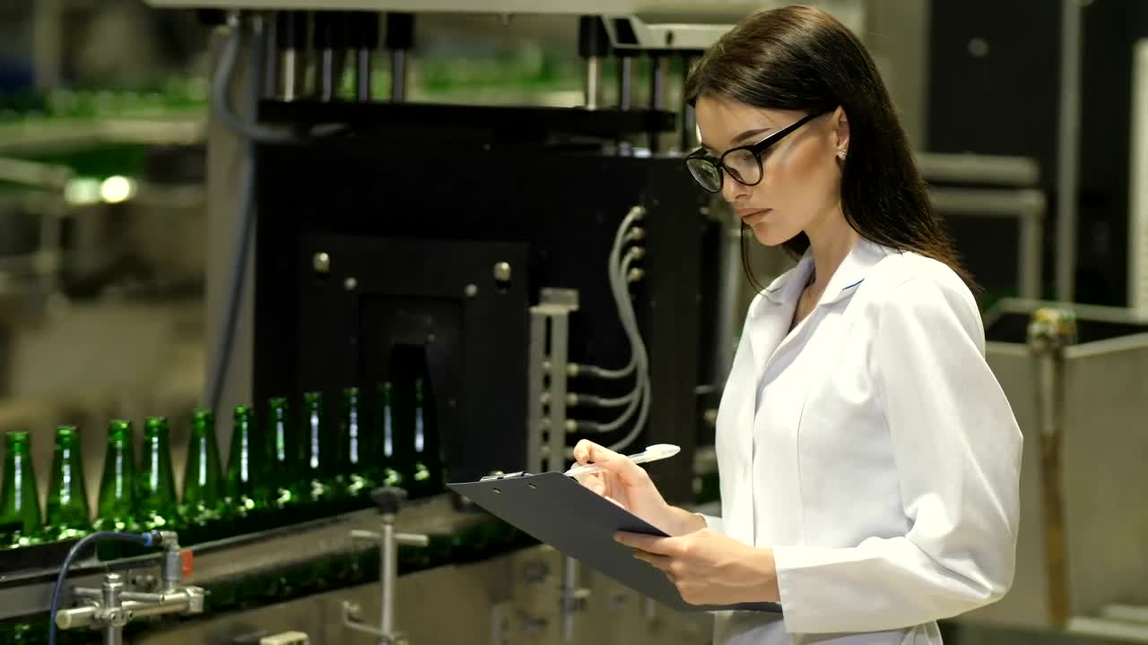 Stock Video Female Inspector Checking Beer Production Live Wallpaper For PC - Free Download