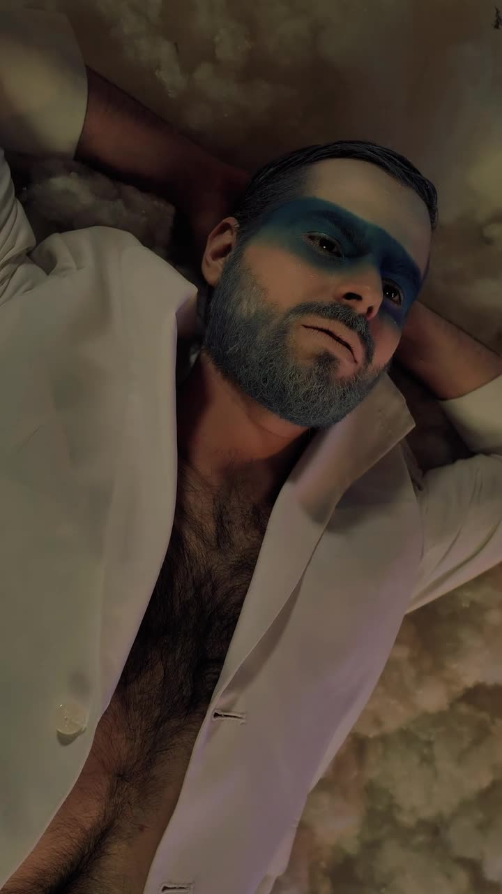 Stock Video Face Of A Man With Winter Makeup Lying Down Live Wallpaper For PC - Free Download