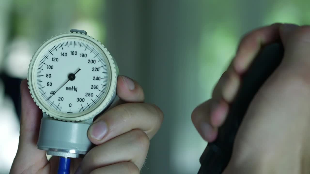 Stock Video Doctors Hands Measuring The Pressure Live Wallpaper For PC - Free Download